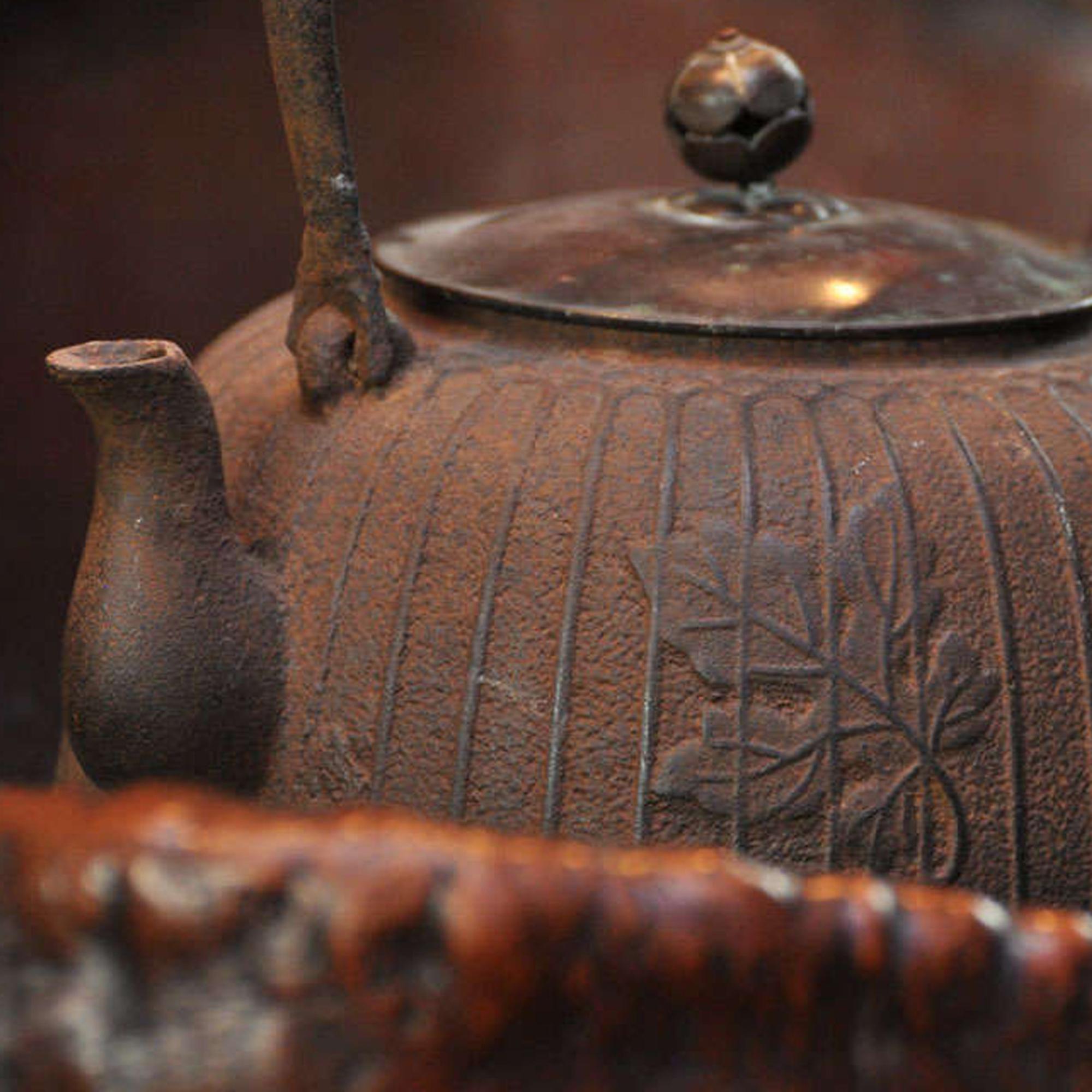 An Edo Period Wood and Copper Hibachi with Teapot and Stand 12 x 16-1/2 x 22 inches — Japan, 18th century