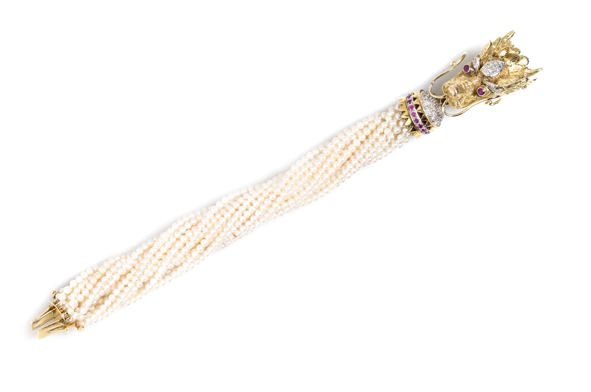 A Yellow Gold, Diamond, Ruby and Cultured Pearl Dragon Torsade Bracelet, 42.10 dwts.