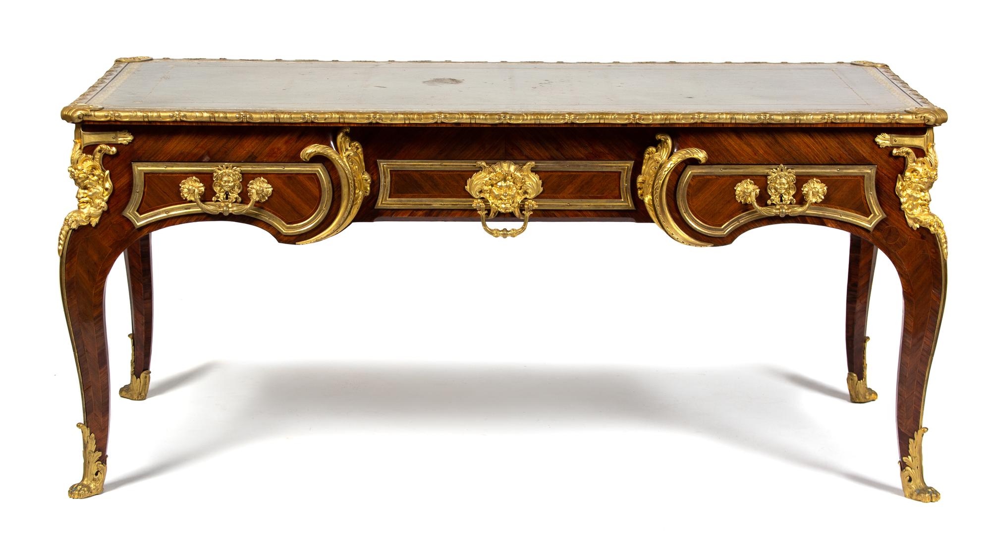 A Fine Louis XV Style Gilt-Bronze-Mounted Tulipwood Bureau Plat Height 31 1/2 x length 5 feet 10 x depth 35 inches. — LATE 19TH CENTURY
