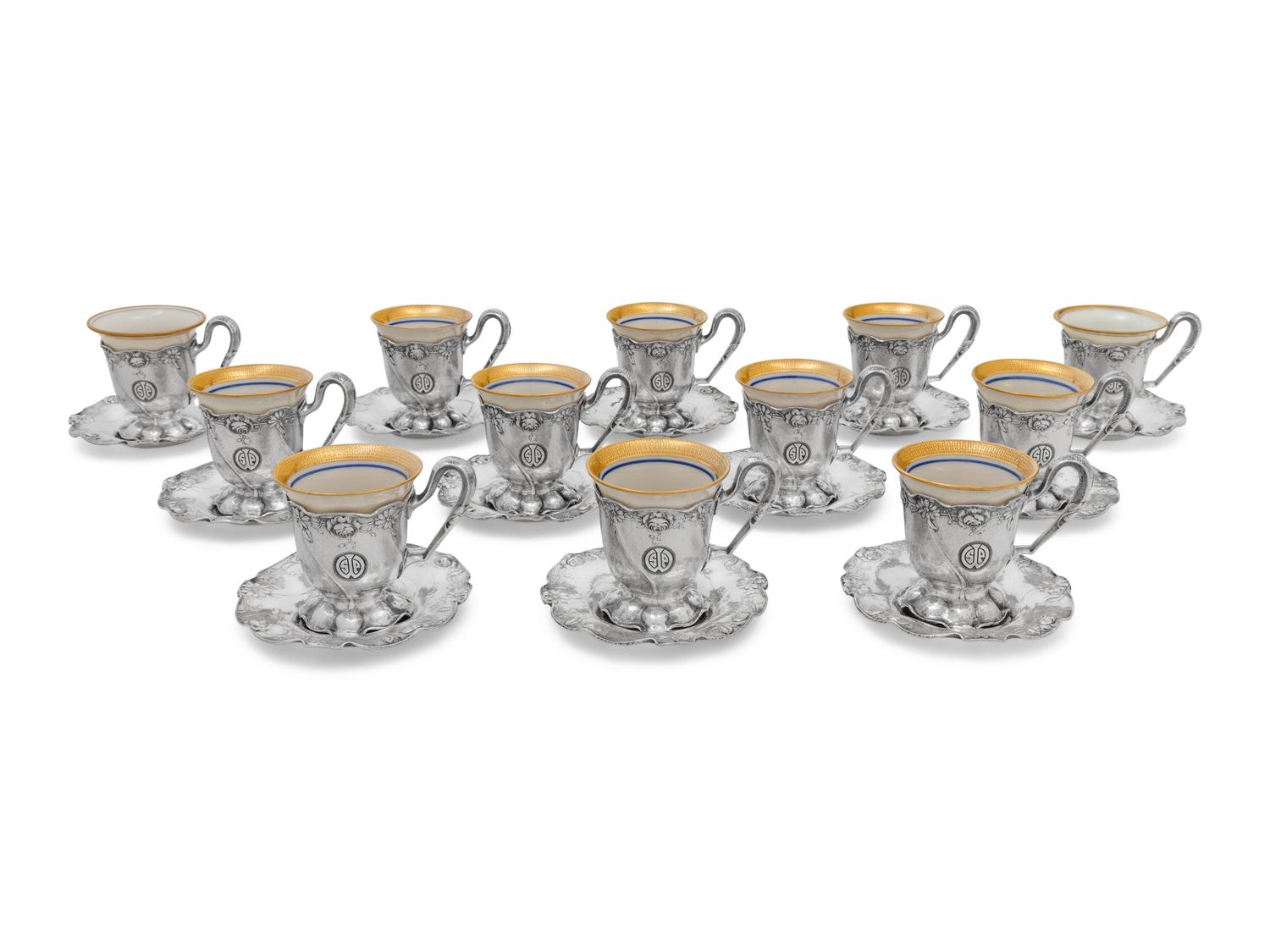 A Set of Twelve American Silver Martelé Coffee Cups and Saucers