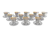 A Set of Twelve American Silver Martelé Coffee Cups and Saucers