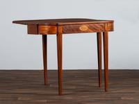 A Federal Figured and Floral Inlaid Mahogany Game Table