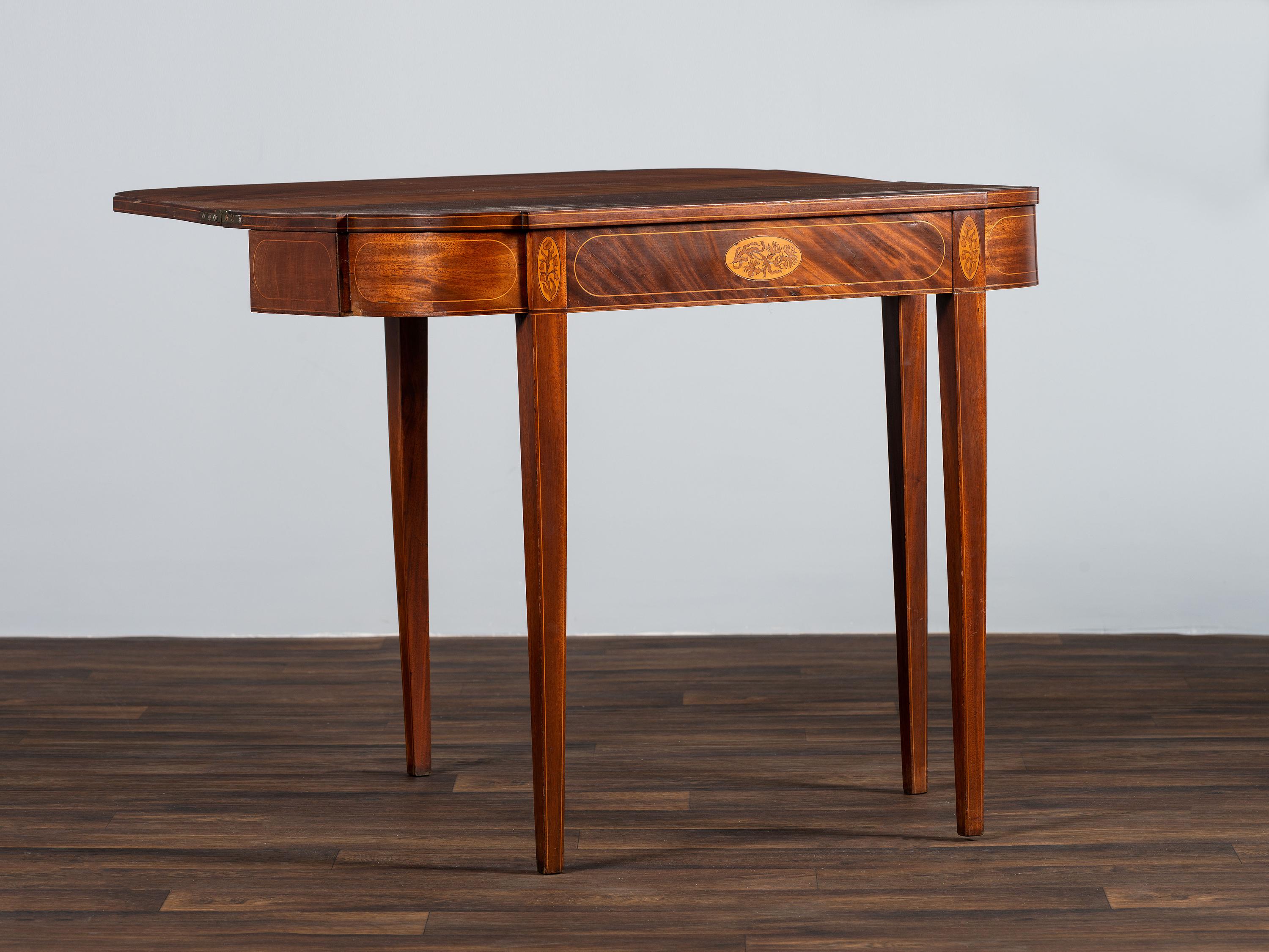 A Federal Figured and Floral Inlaid Mahogany Game Table