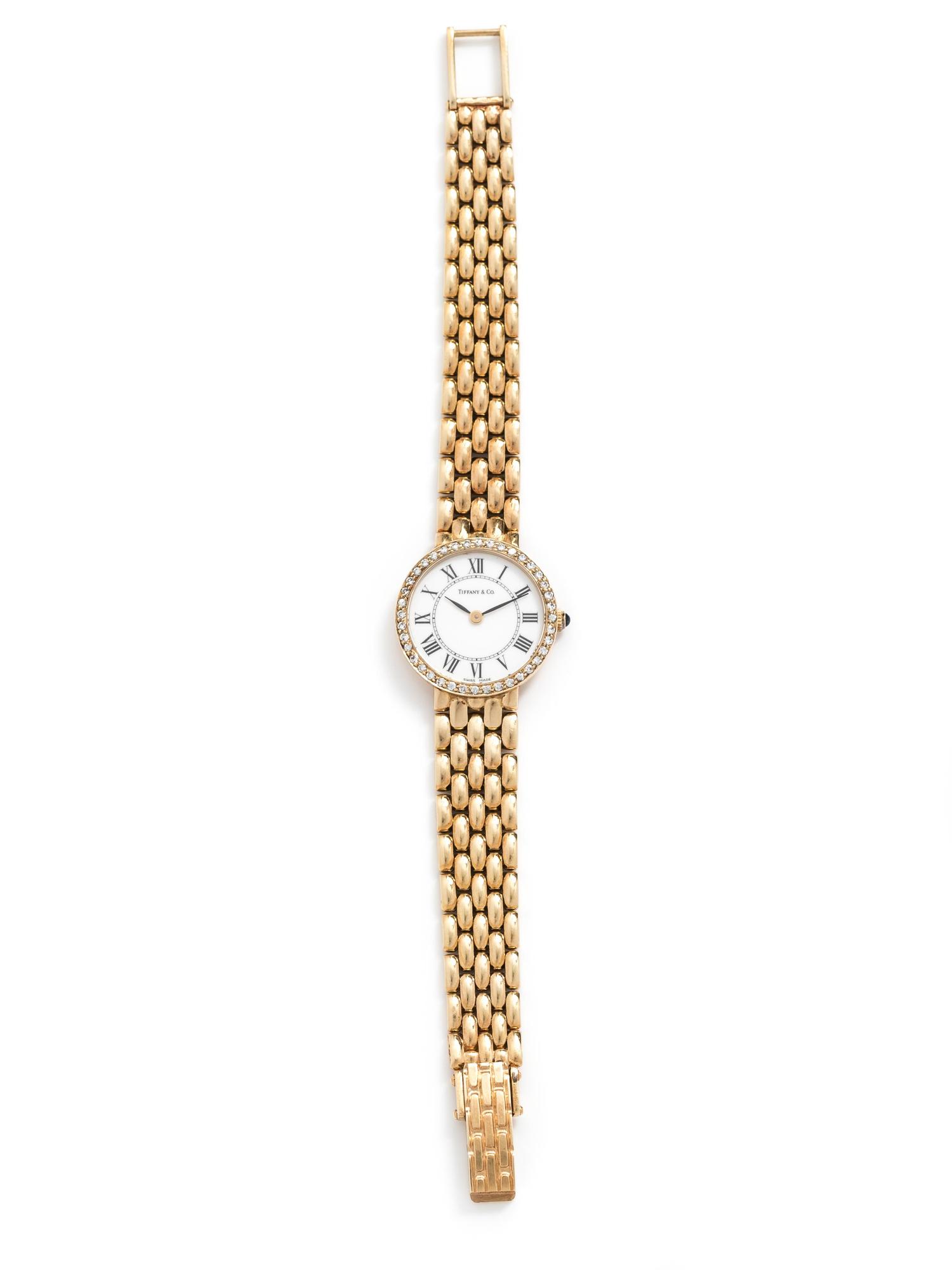 TIFFANY & CO., 14K AND DIAMOND WRISTWATCH