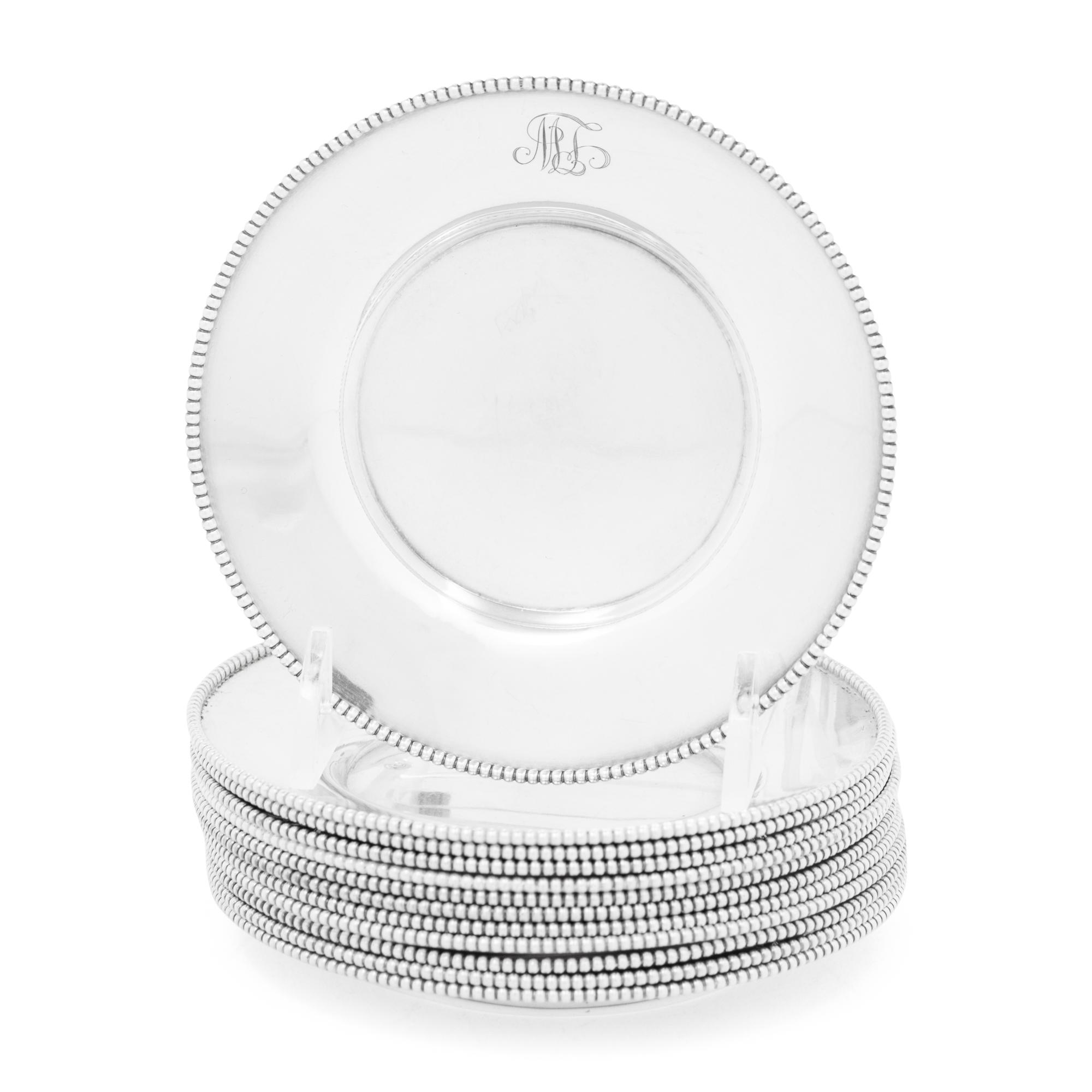 A Set of Twelve American Silver Bread Plates