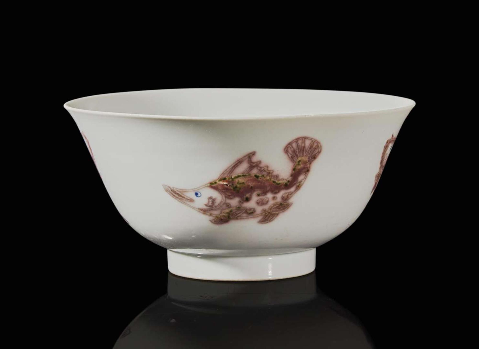 A Chinese underglaze red and blue-decorated "Fishes" bowl, Kangxi period 青花釉裡紅盌 清 康熙
