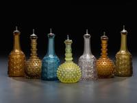 Seven Glass Barber Bottles