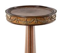 An Empire Style Gilt Metal Mounted Fruitwood Pedestal Table