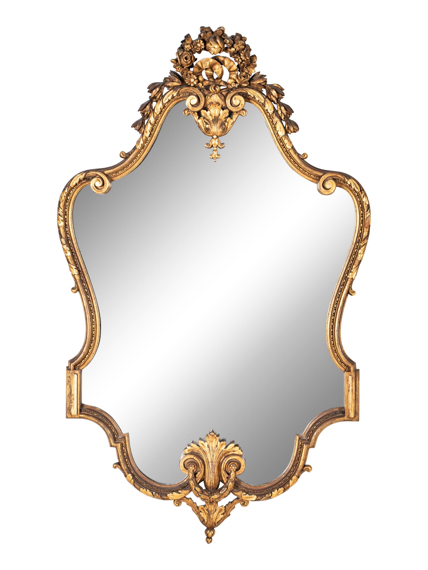 An Italian Baroque Style Giltwood Mirror