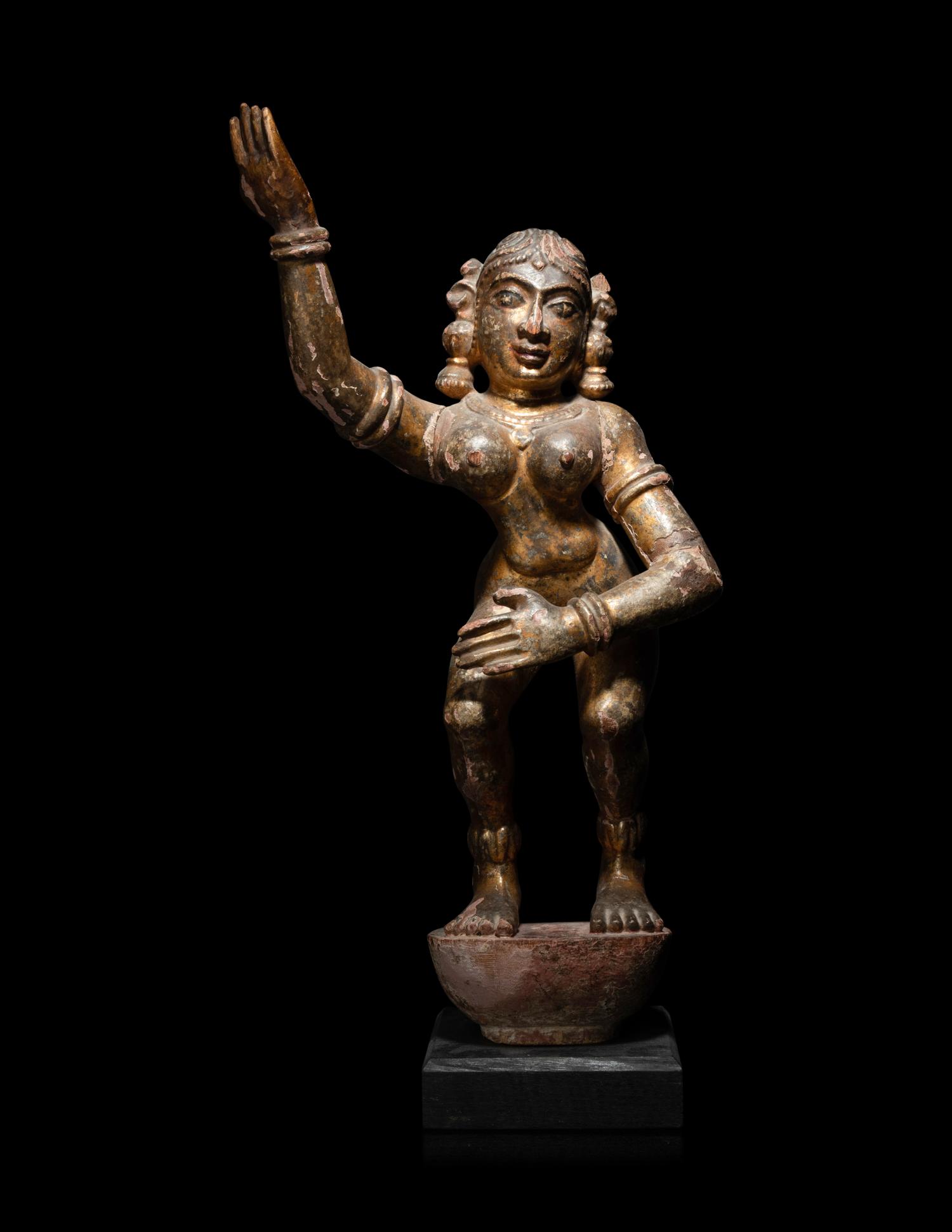 An Indian Gilt Highlighted Carved Wood Dancing Figure