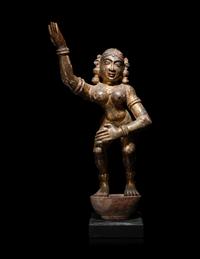 An Indian Gilt Highlighted Carved Wood Dancing Figure