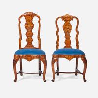An assembled pair of Dutch Rococo inlaid walnut and marquetry side chairs circa 1750