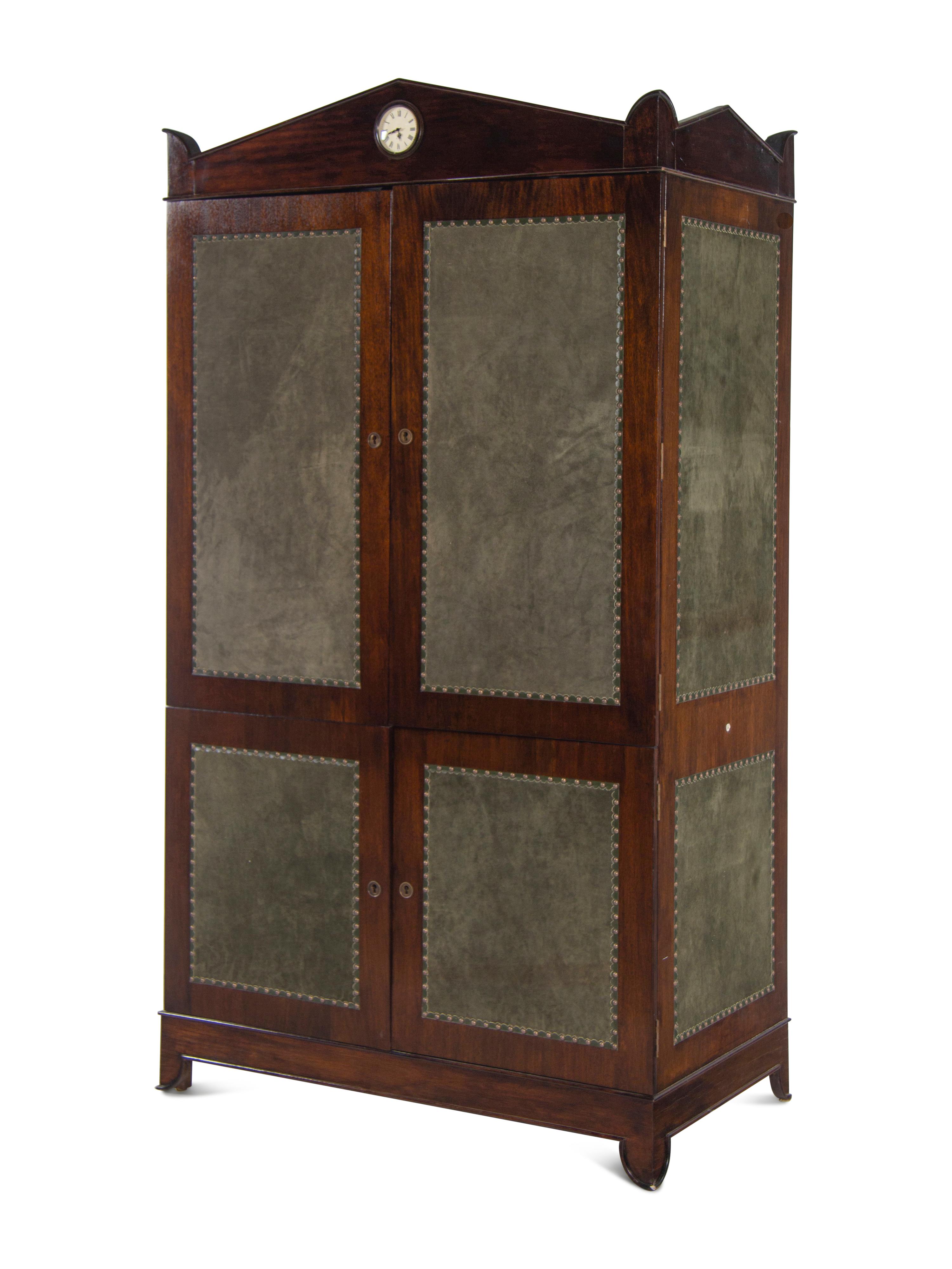 A Regency Style Suede-Inset Mahogany Armoire