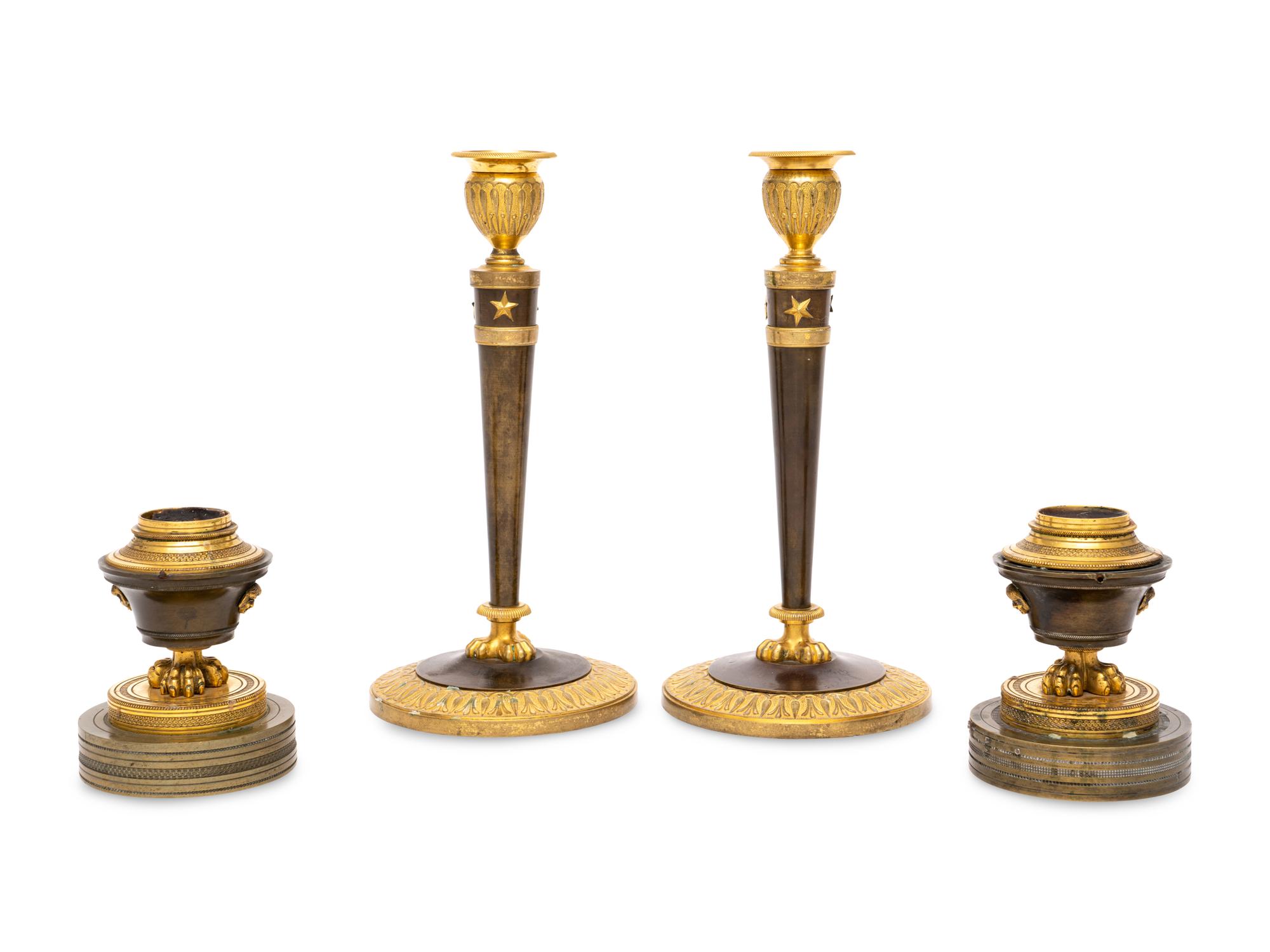 Two Pairs of Empire Gilt Bronze Candlesticks