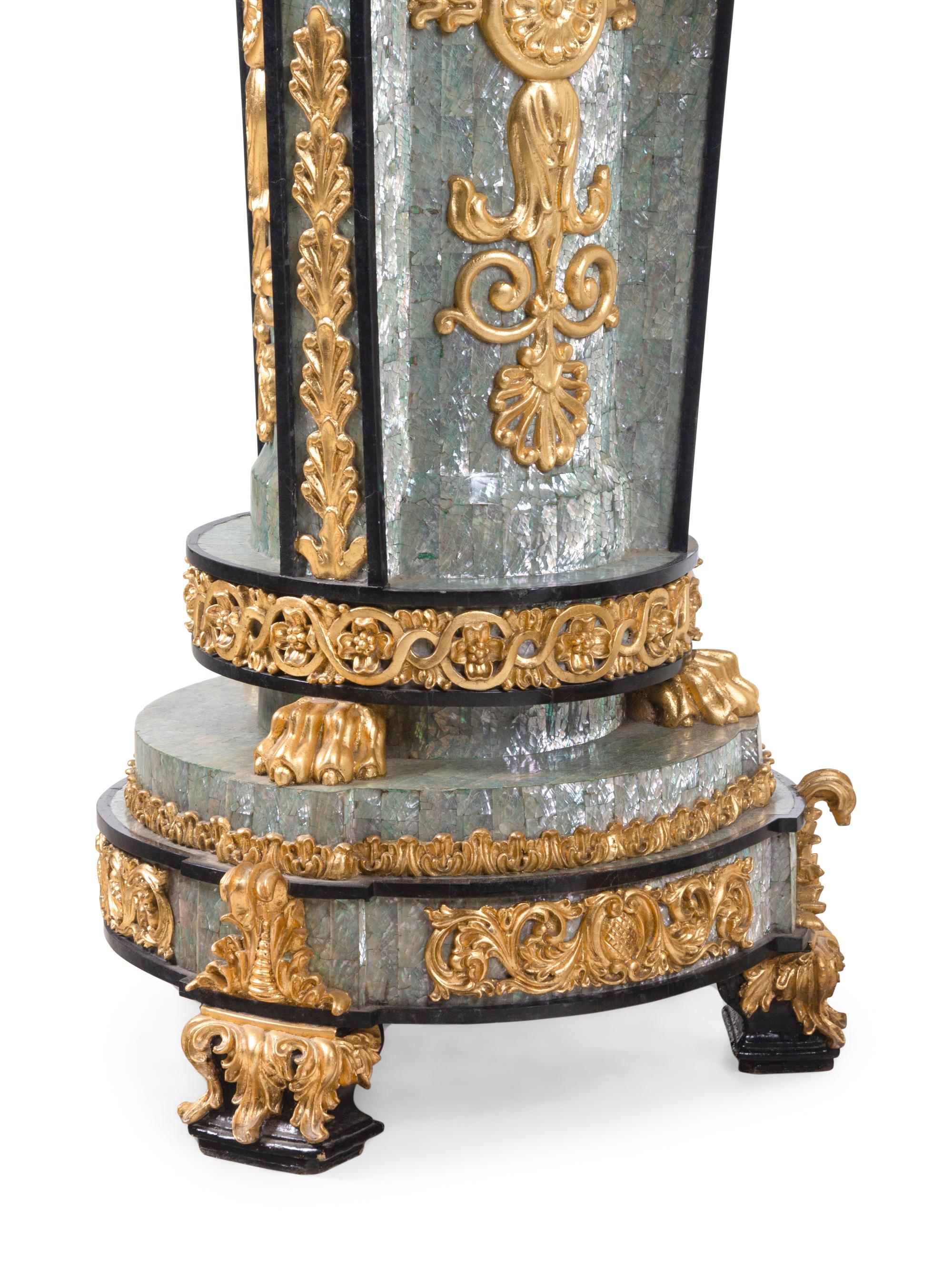 A Pair of Neoclassical Style Gilt Composite and Abalone Veneered Urns and Pedestals