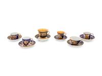 An Assembled Set of Six Sèvres Style Painted and Parcel Gilt Porcelain Teacups and Saucers