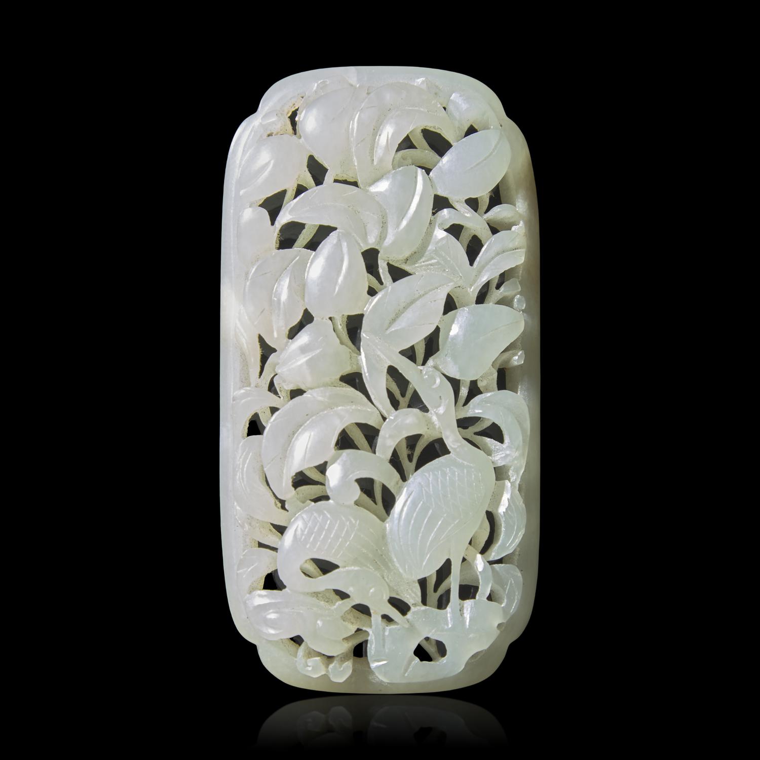 A Chinese Pale Celadon Jade 'Cranes and Peaches' Reticulated Plaque, 19th Century or Earlier 清晚期 青白玉鏤雕蓮塘鷺影牌