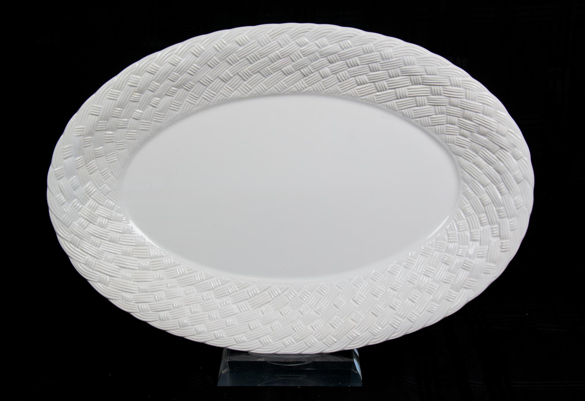 Four Miscellaneous Serving Platters Largest diameter 18 1/2 inches.