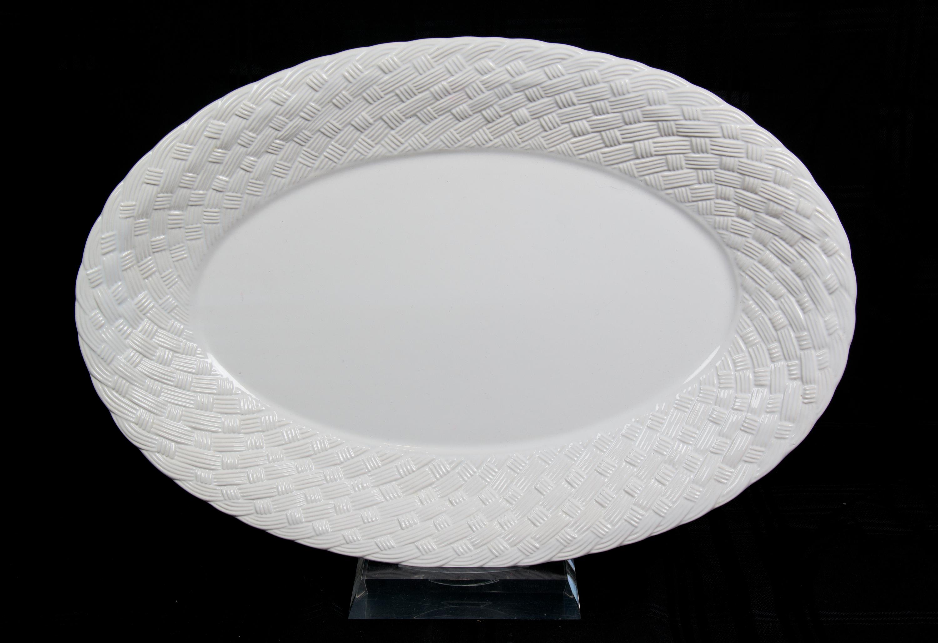 Four Miscellaneous Serving Platters Largest diameter 18 1/2 inches.