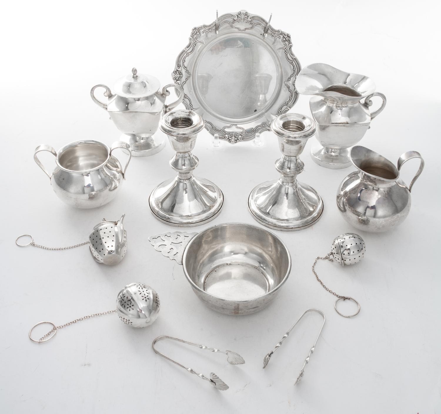 A Collection of American Silver Articles, Various Makers, comprising three tea strainers, a saucer, two sugar tongs, two sugars, two cr