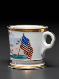 A Patriotic Porcelain Shaving Mug Depicting the U.S.S. Mississippi