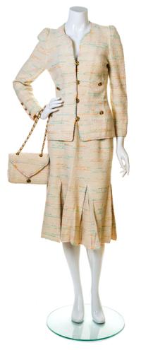 An Adolfo Cream Boucle Skirt Ensemble, No size. Handbag: 8'' x 6''; Strap drop: 10''.