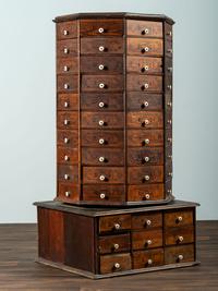 An American Bolt and Screw Case Company Stenciled Pine Octagonal Rotating Cabinet