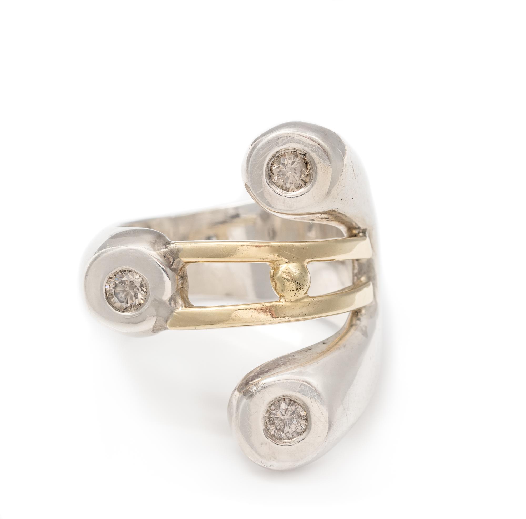 A Sterling Silver, Yellow Gold and Diamond Ring, 9.90 dwts.