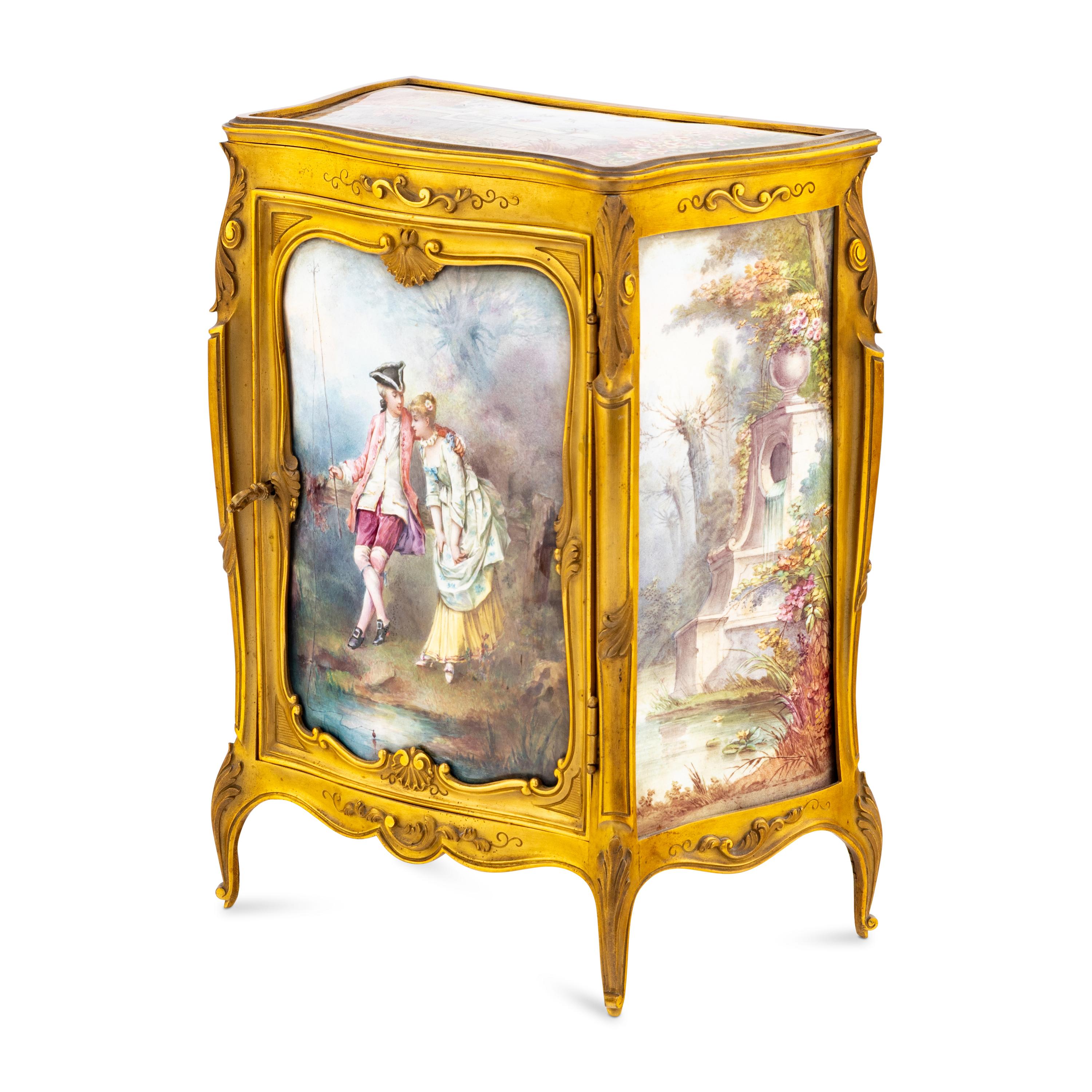 A French Gilt Bronze and Enamel Table Cabinet