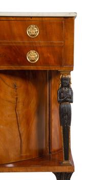 A Russian or Baltic Neoclassical Parcel Ebonized and Gilt Bronze Mounted Mahogany Marble-Top Cabinet