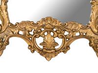 A Rococo Style Giltwood Trumeau Mirror