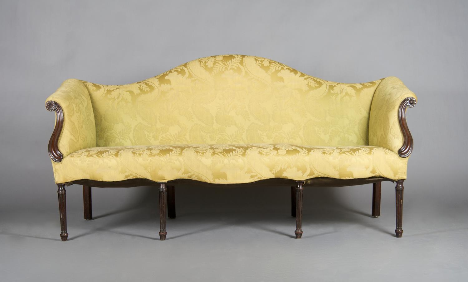 A Victorian Camel Back Sofa, Height 36 x width 74 1/2 x depth 34 inches.