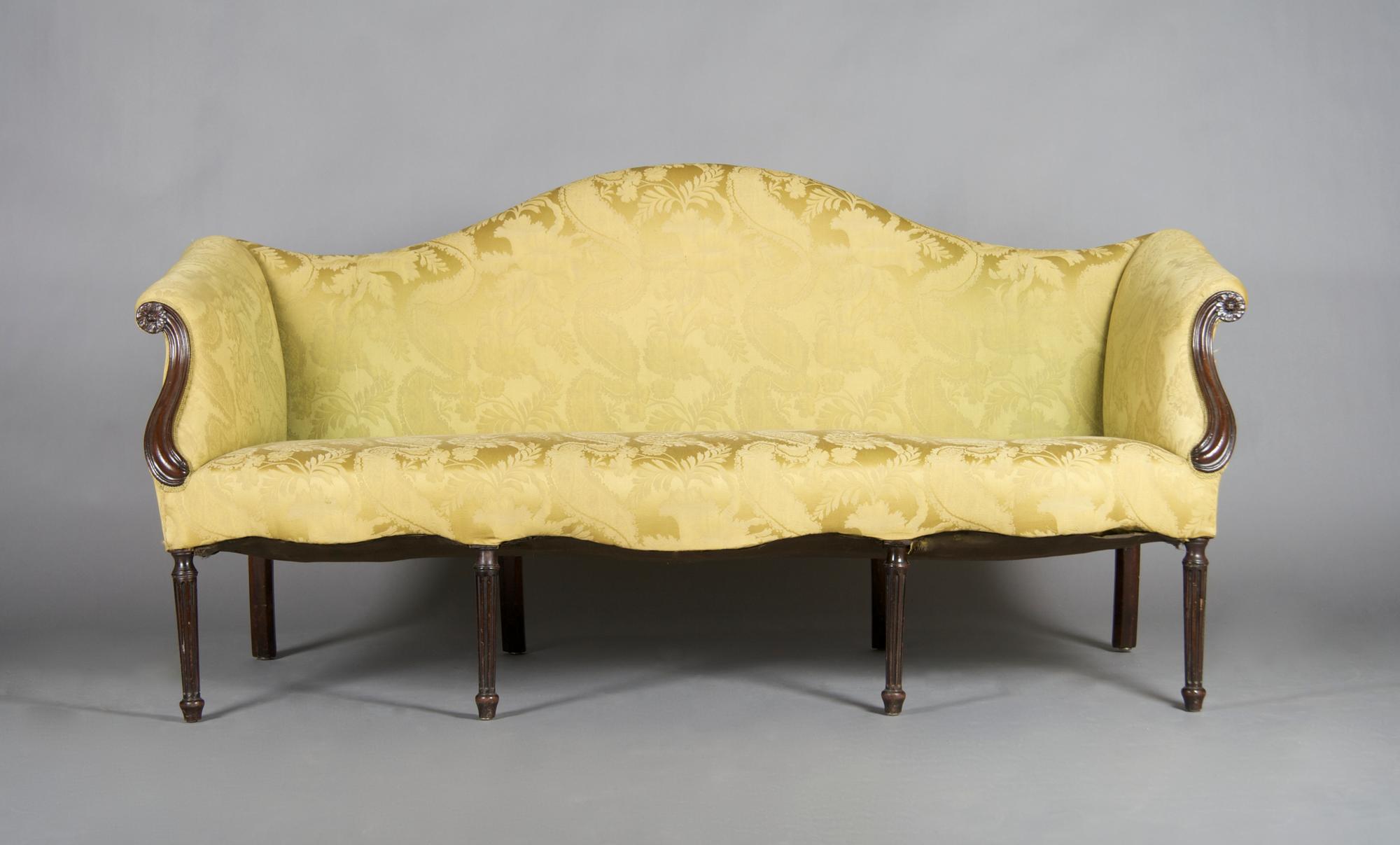 A Victorian Camel Back Sofa, Height 36 x width 74 1/2 x depth 34 inches.