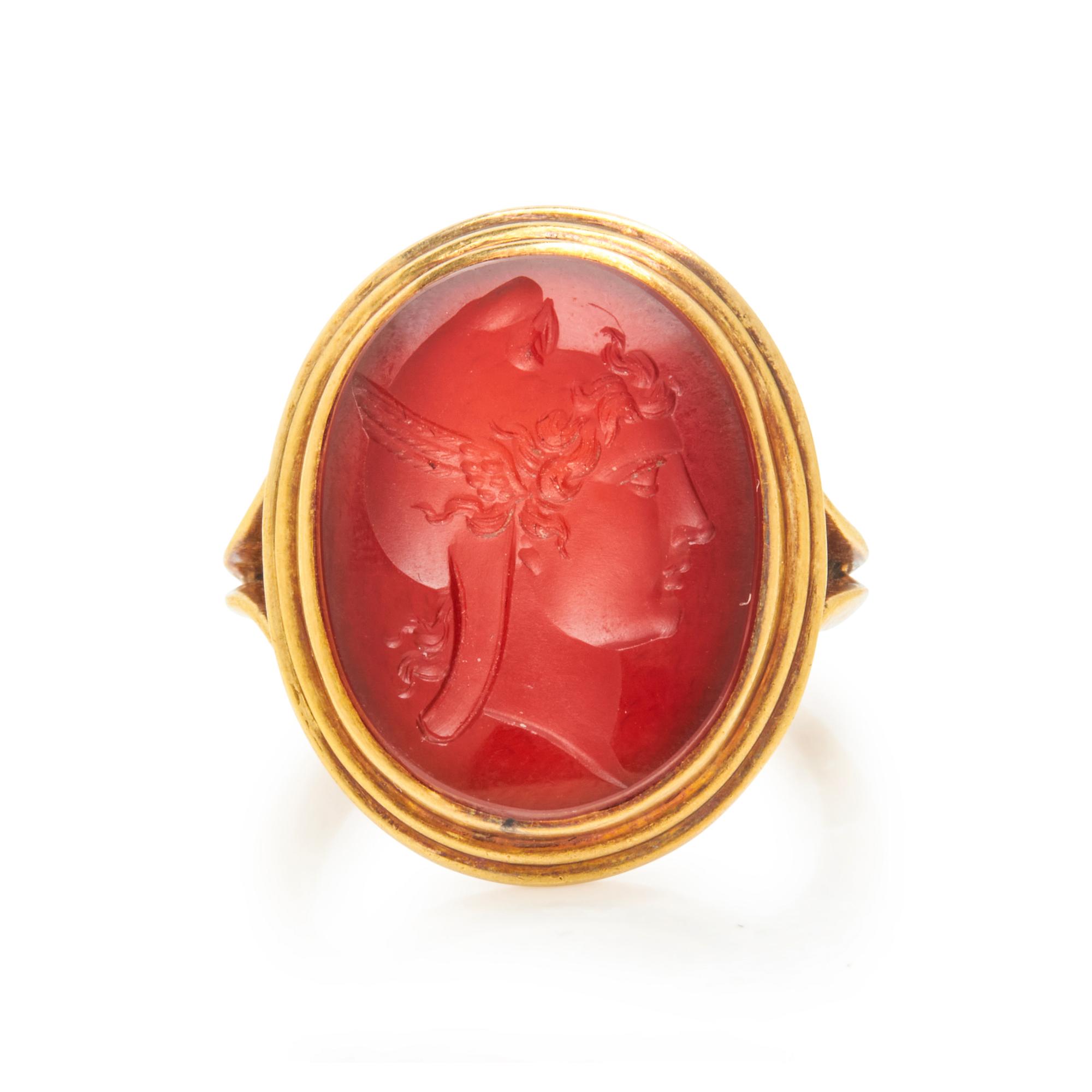 YELLOW GOLD AND CARVED CARNELIAN INTAGLIO RING