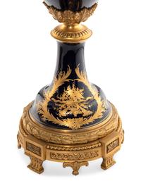 A Pair of Gilt Bronze Mounted Sèvres Style Porcelain Urns