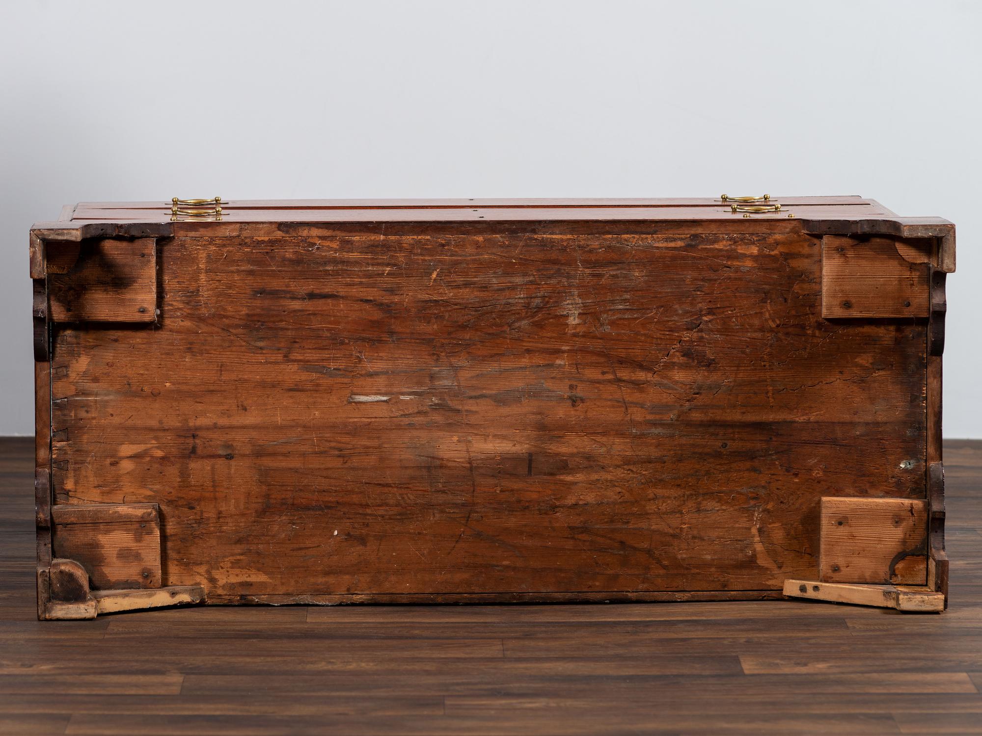 A Chippendale Figured Mahogany Linen Press