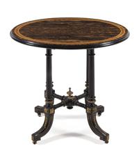 A Victorian Calamander and Ebony Occasional Table LATE 19TH CENTURY having an oval top with a mo... — LATE 19TH CENTURY