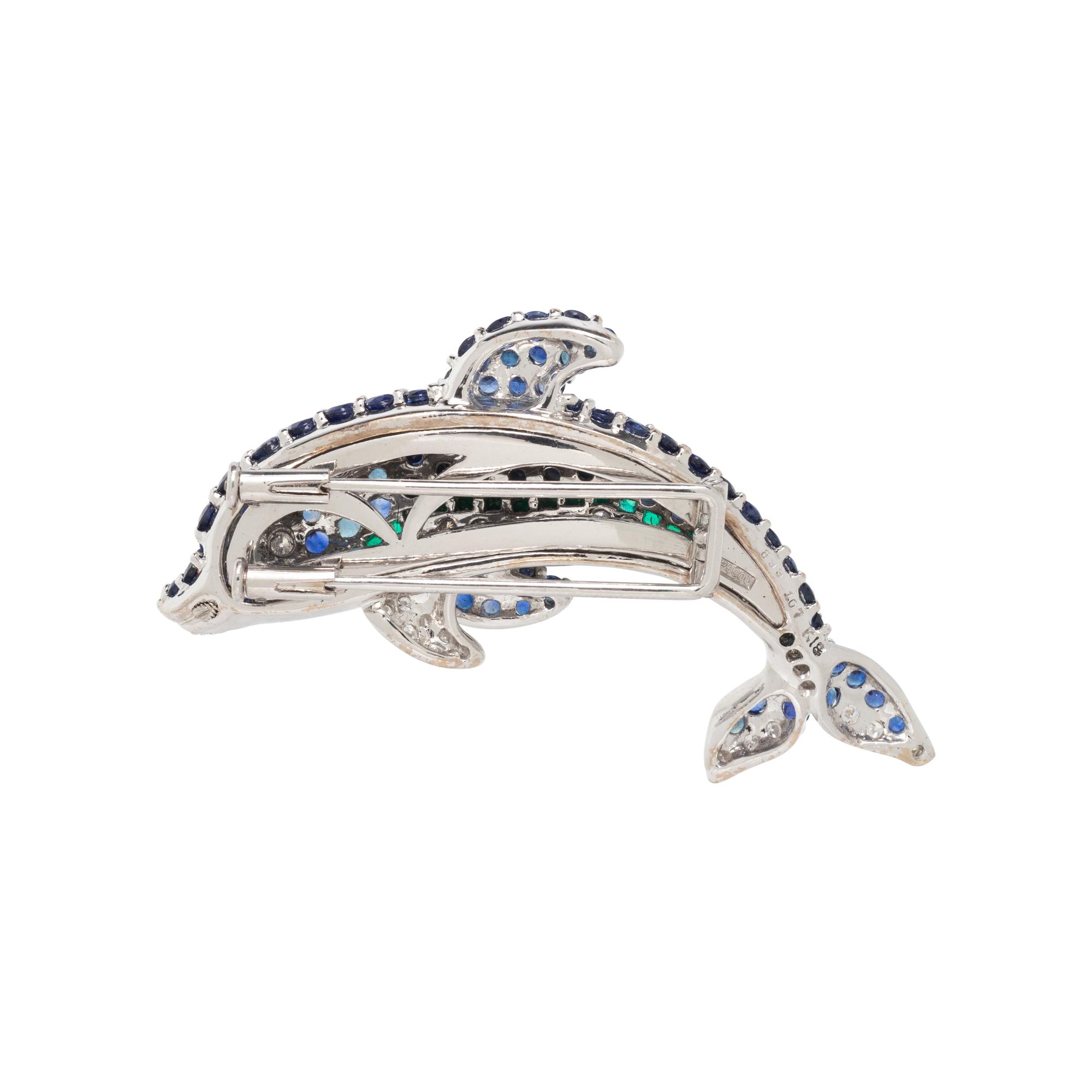 SAPPHIRE, EMERALD, AND DIAMOND DOLPHIN BROOCH