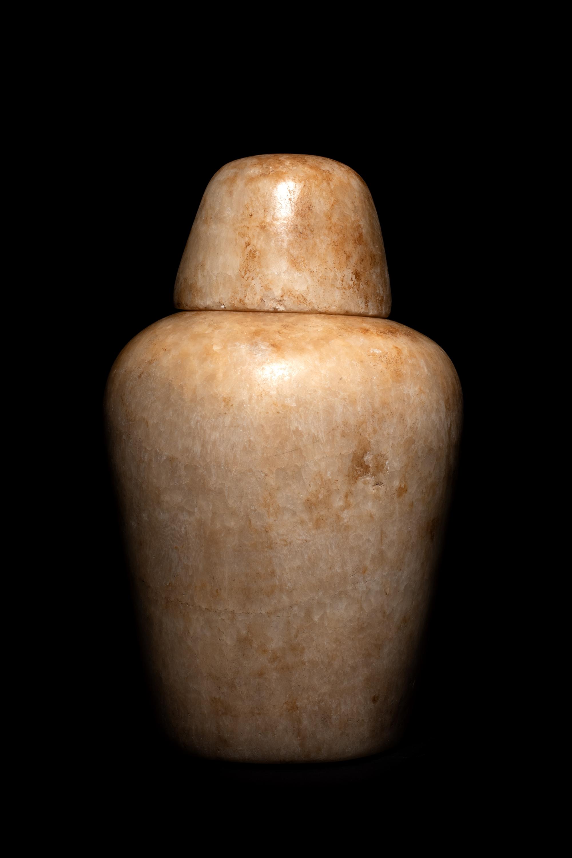 An Egyptian Alabaster Canopic Jar