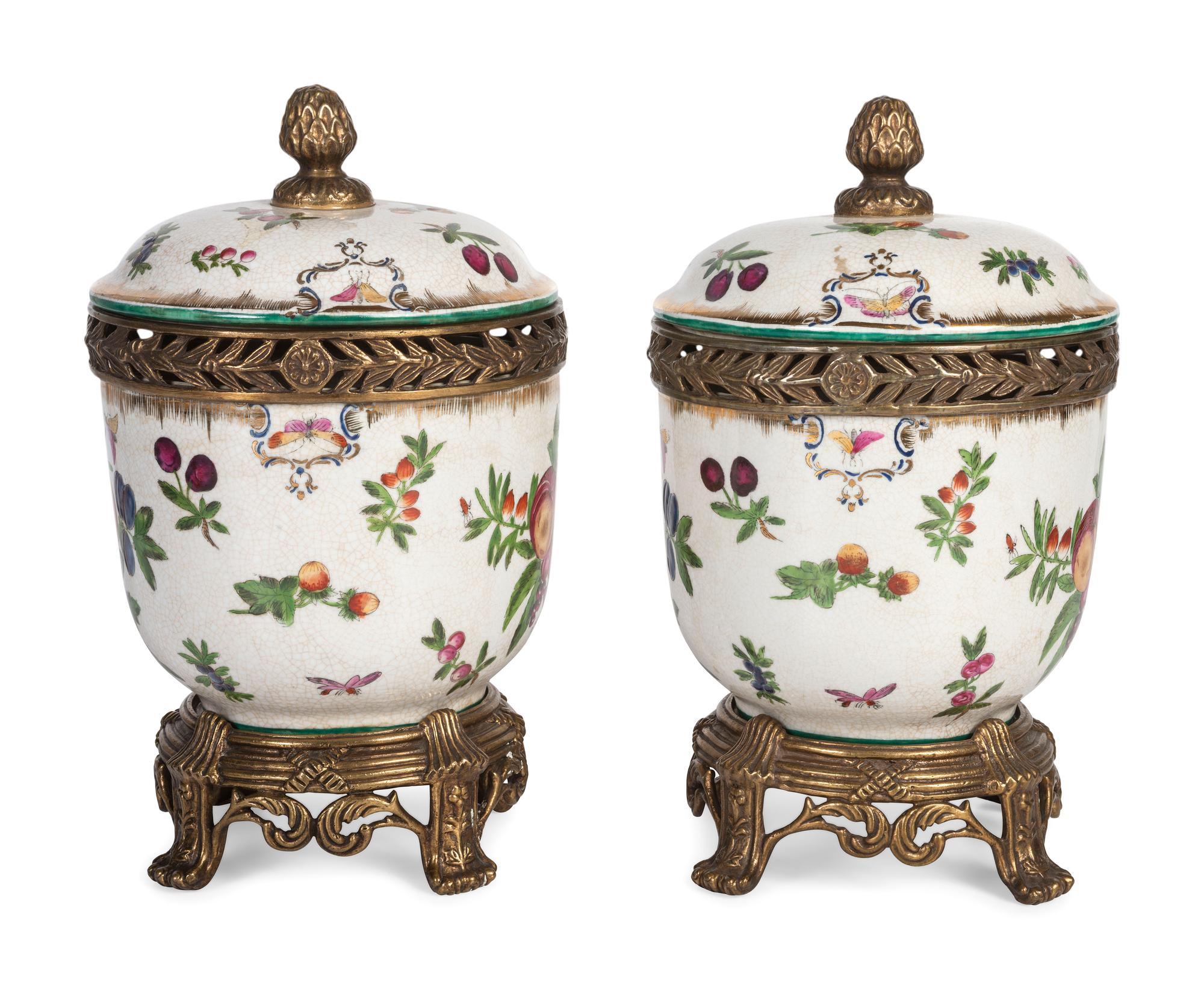 A Pair of United Wilson Gilt Metal Mounted Porcelain Urns