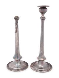 A Pair of Arts & Crafts Spot-Hammered Silver Candlesticks