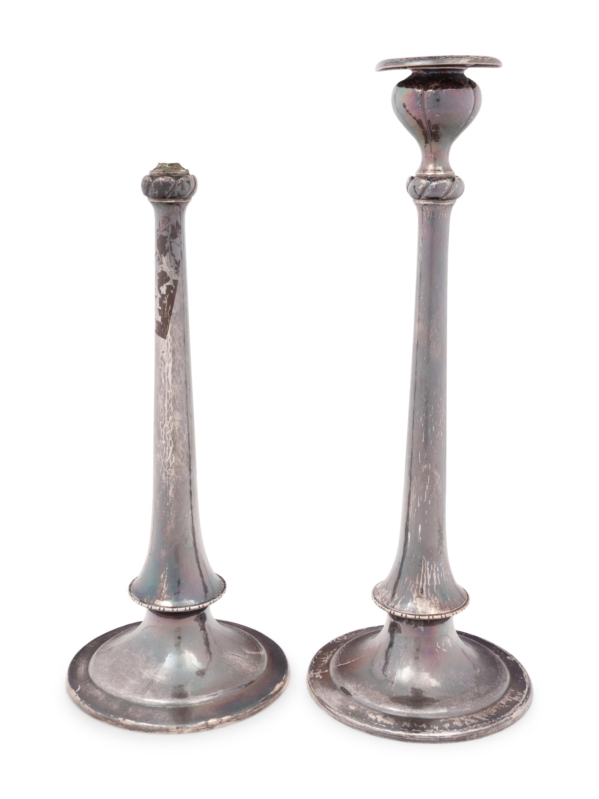A Pair of Arts & Crafts Spot-Hammered Silver Candlesticks