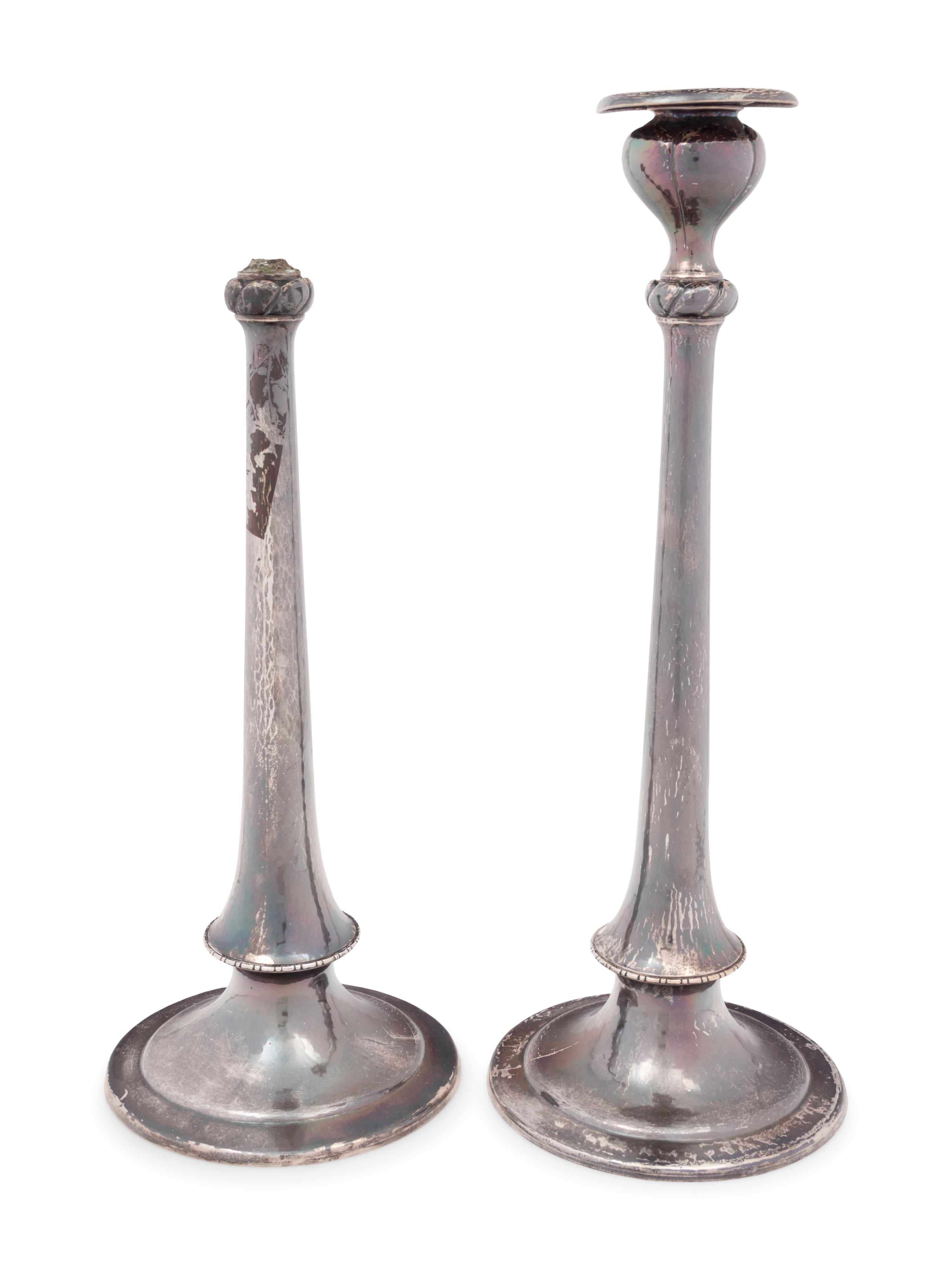 A Pair of Arts & Crafts Spot-Hammered Silver Candlesticks