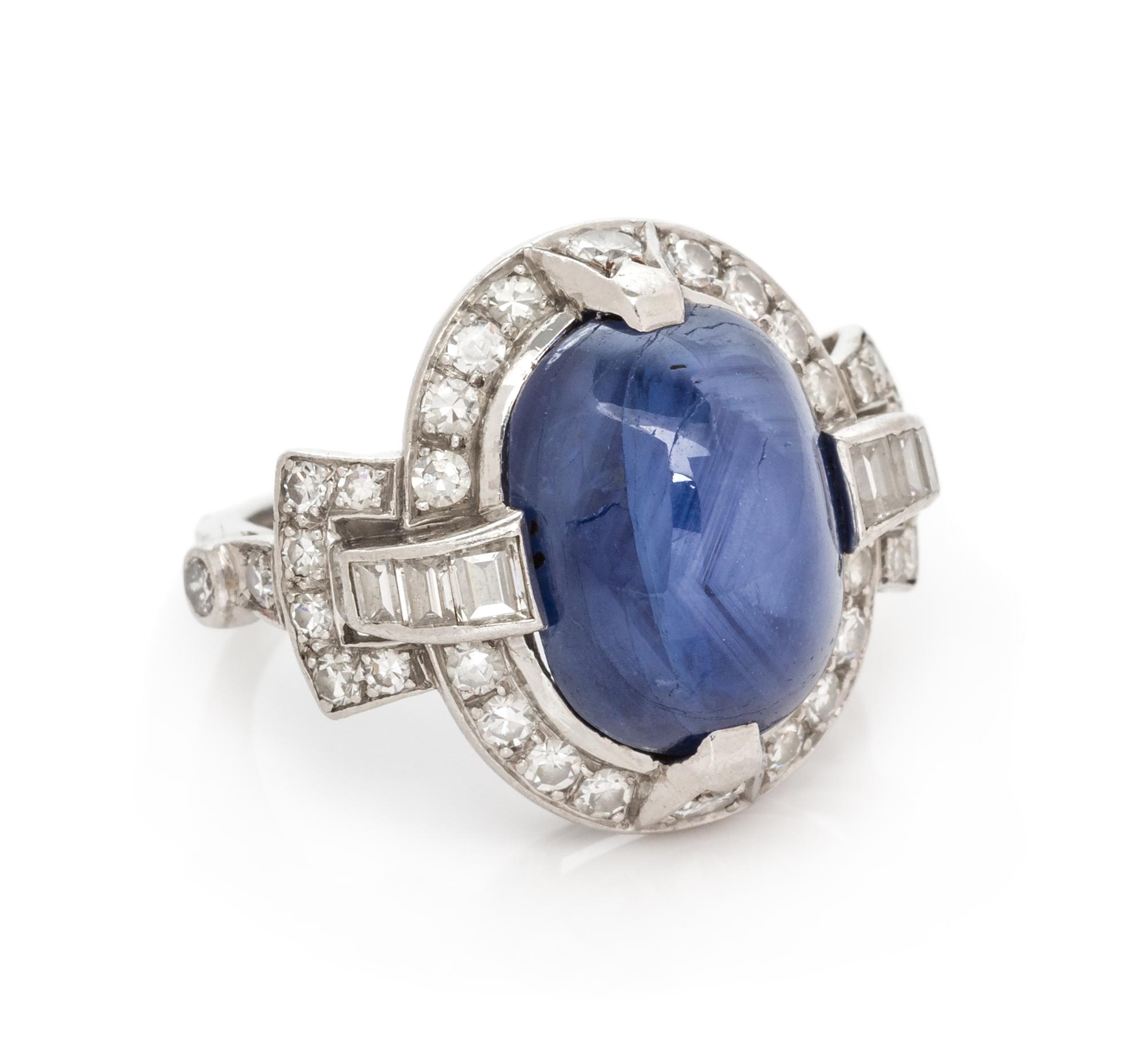 An Art Deco Platinum, Sapphire and Diamond Ring, 5.80 dwts.