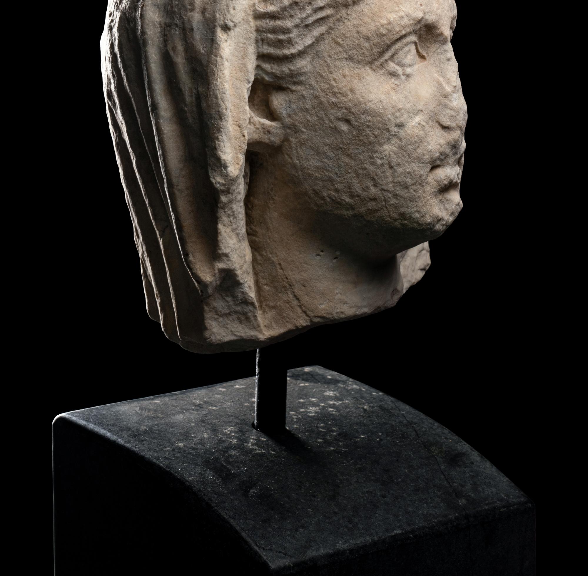 A Late Hellenistic Marble Head of a Veiled Woman