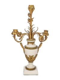 A French Gilt Bronze and Marble Clock Garniture