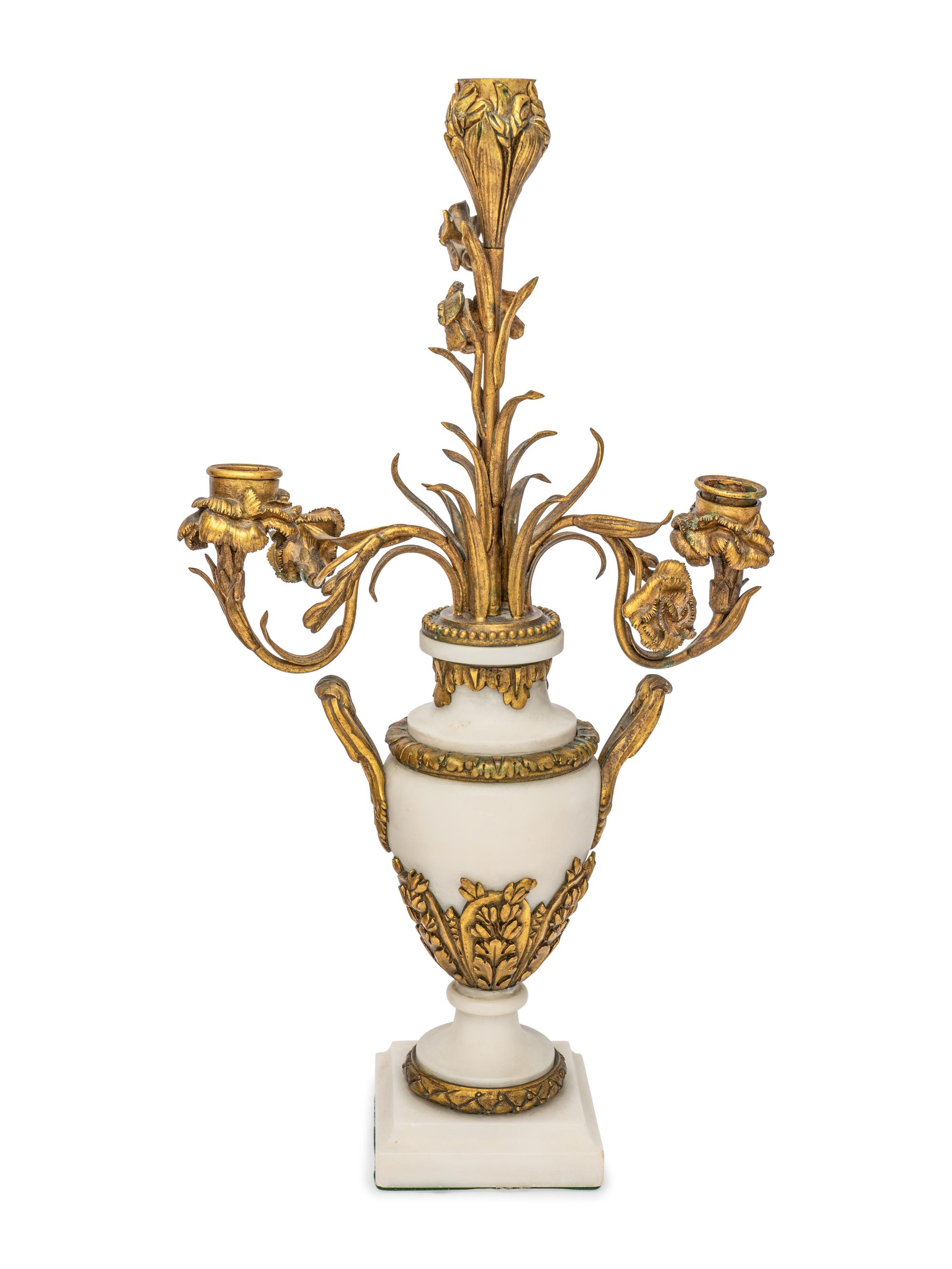 A French Gilt Bronze and Marble Clock Garniture