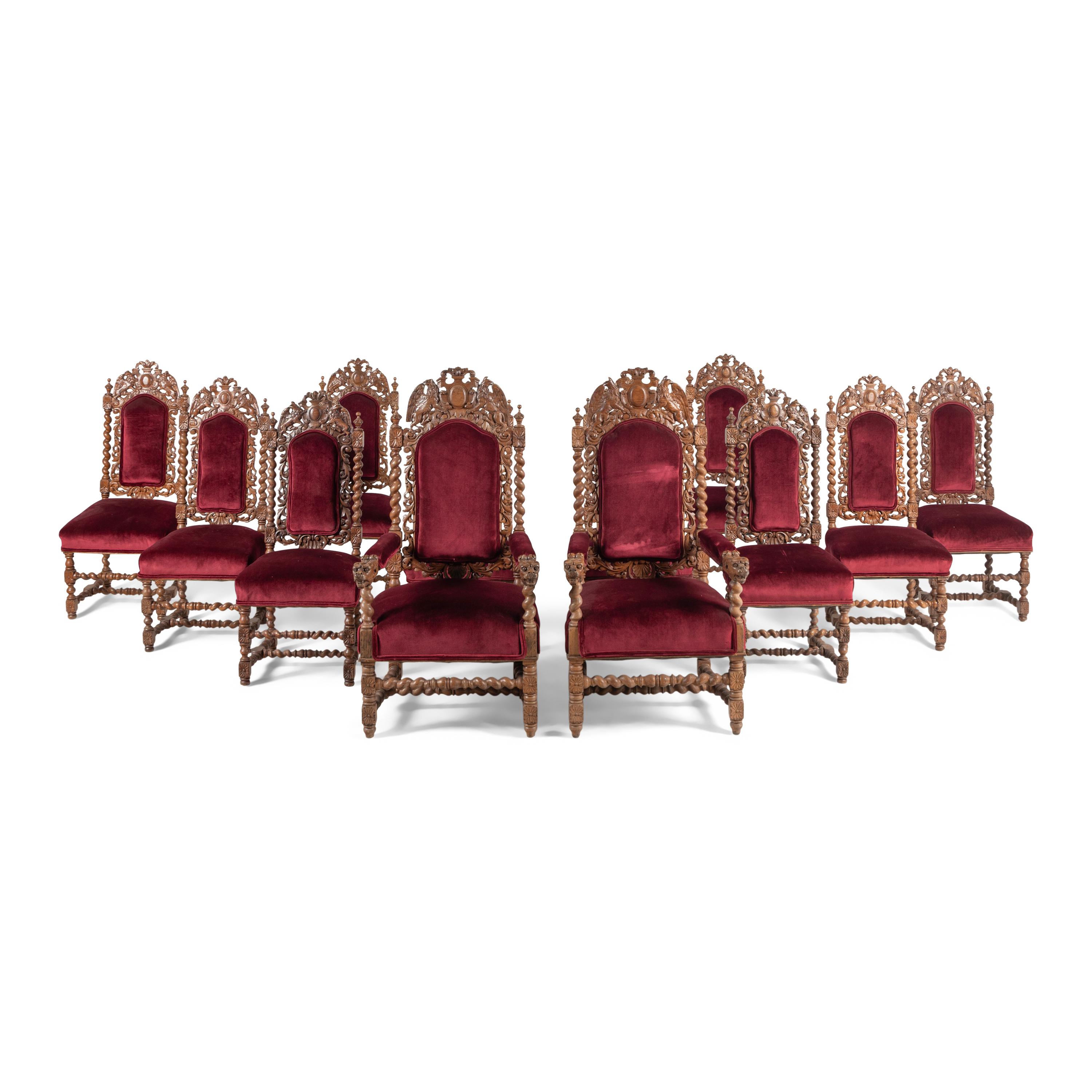 A Set of Twelve Charles II Style Carved Oak Dining Chairs