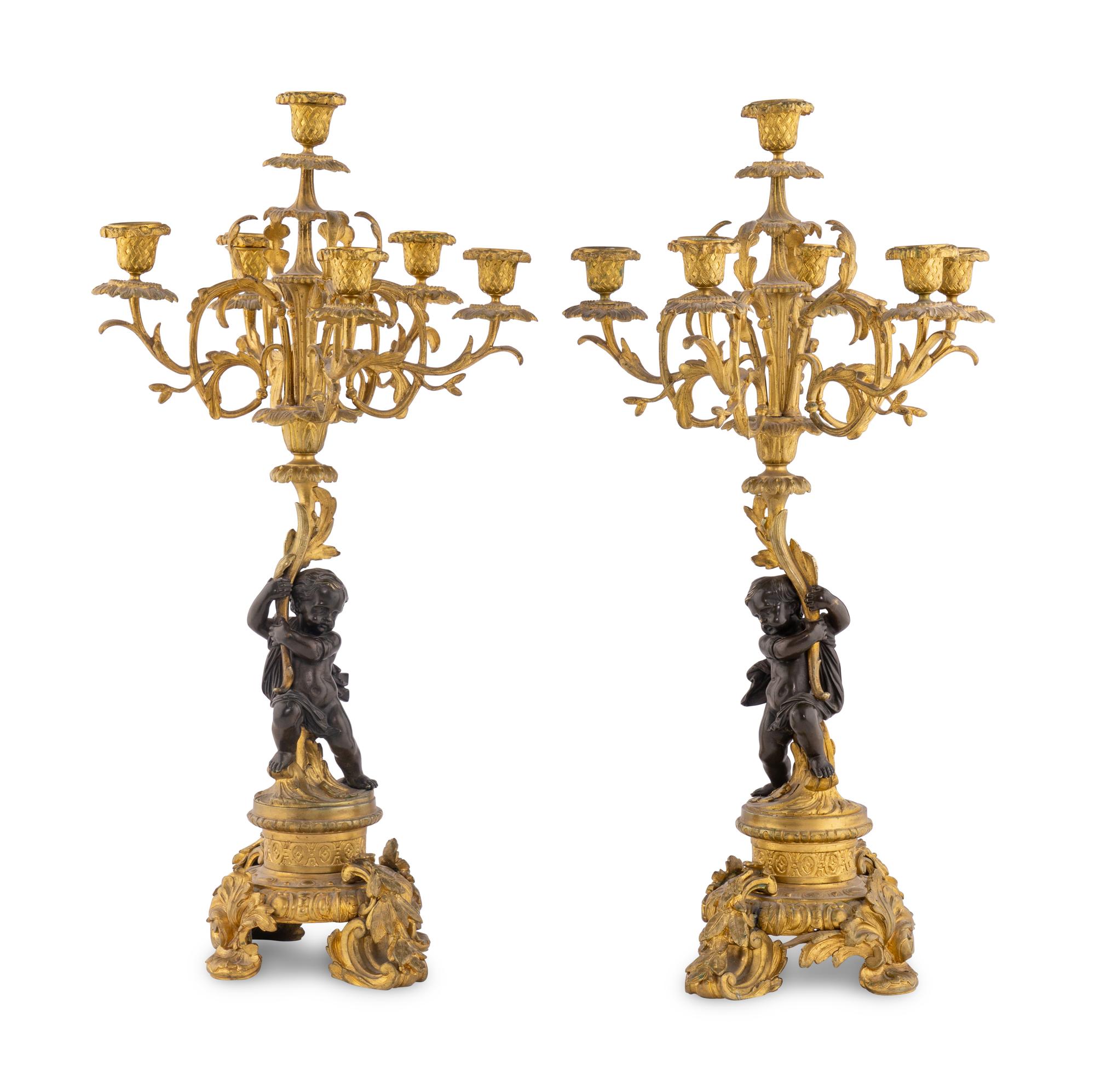 A Pair of French Gilt and Patinated Bronze Six-Light Candelabra