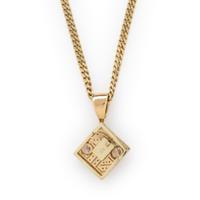 DIAMOND, RUBY, AND YELLOW GOLD PENDANT NECKLACE